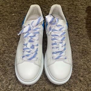 White Sneakers with Blue Accents